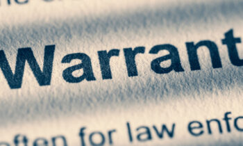 how far behind in child support before a warrant is issued